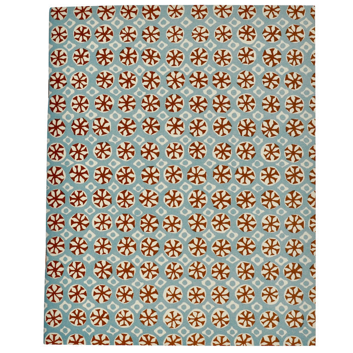 Back cover of the notebook with brown and beige design on a blue background