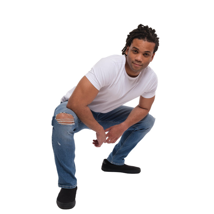Medium blue ripped jeans with distressed knee detail, slim thick fit style.