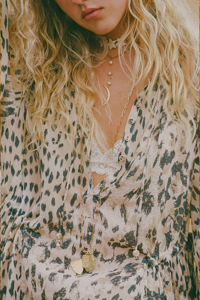 Spell women's Snow Leopard Asymmetric Blouse in cream organic cotton ECOVERO blend with contrast lace trim