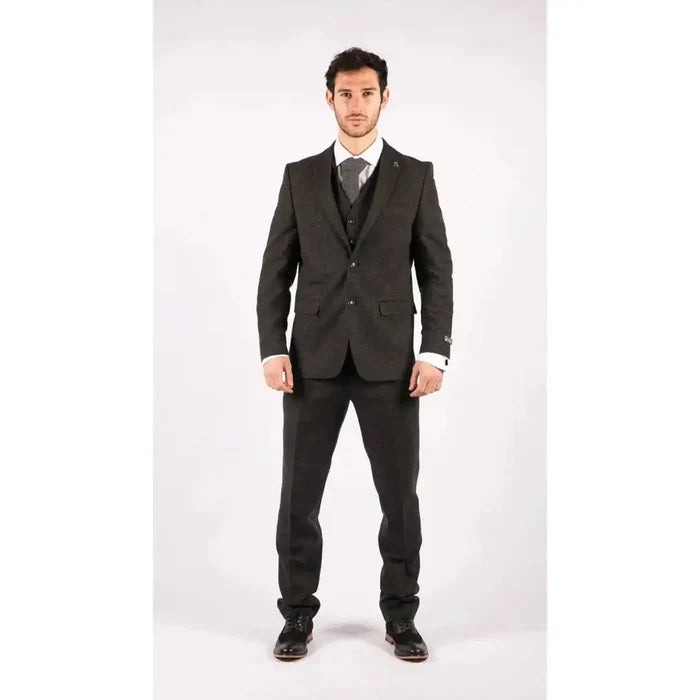 Male model in black tailored suit with matching blazer, vest, white shirt, and grey tie, suitable for business or formal occasions.