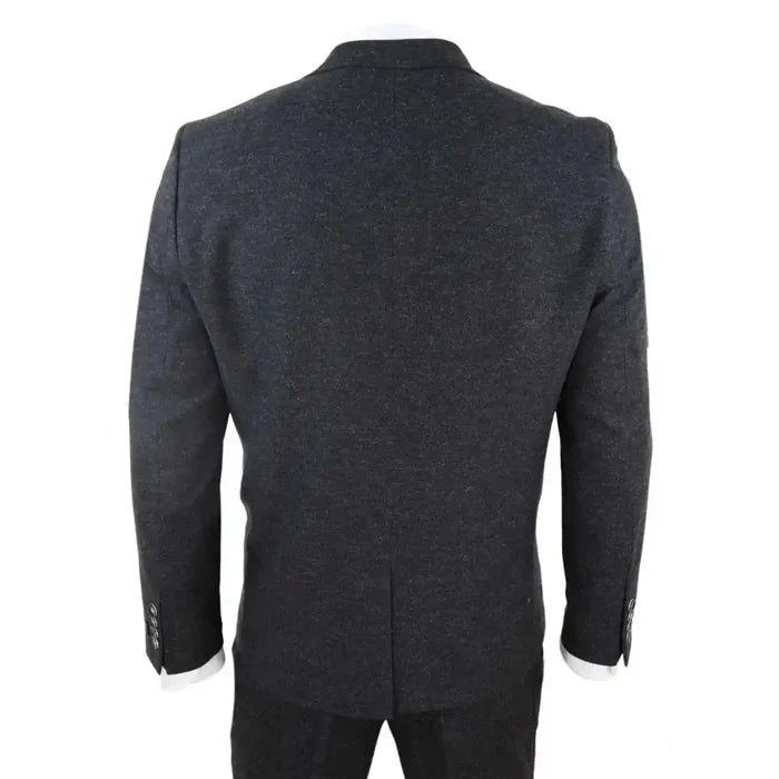 Back view of dark gray men's wool tweed suit jacket showing tailored fit, structured shoulders, and buttoned sleeve cuffs, classic style.