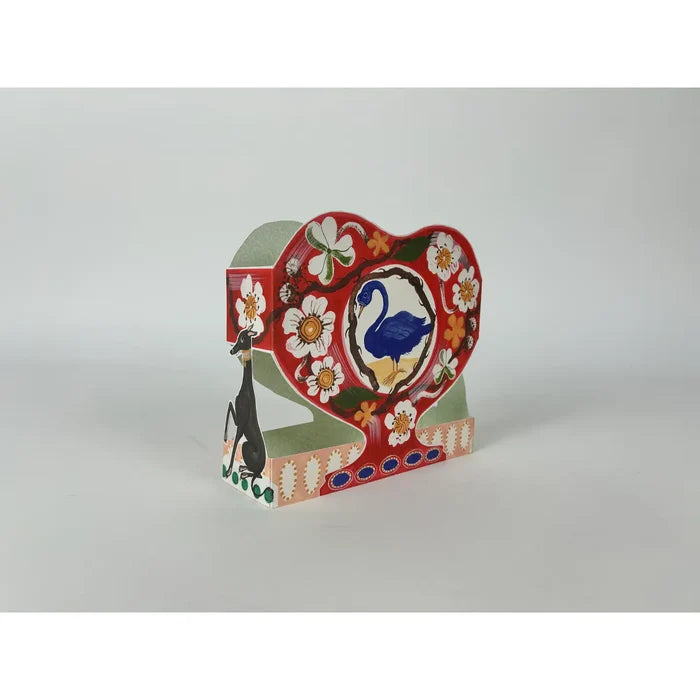 pop-up card with floral patterns and a swan design on a white background