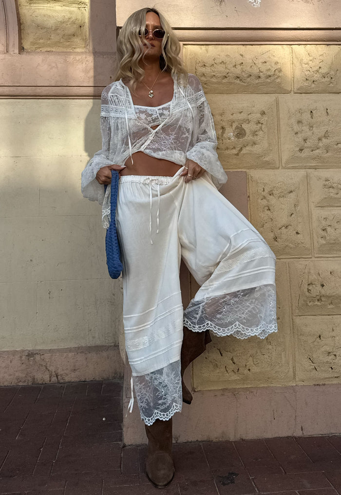 Model wearing Sea Salt Teodora Lace Pantaloon, front view showing lace hem, pintucks, and self-tie leg details
