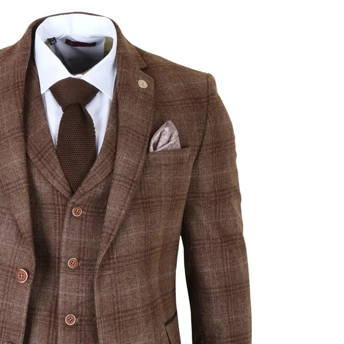 Men's brown tweed check 3-piece suit with tailored blazer, matching waistcoat, and trousers, featuring a white dress shirt, brown knit tie, and pocket square for formal occasions.