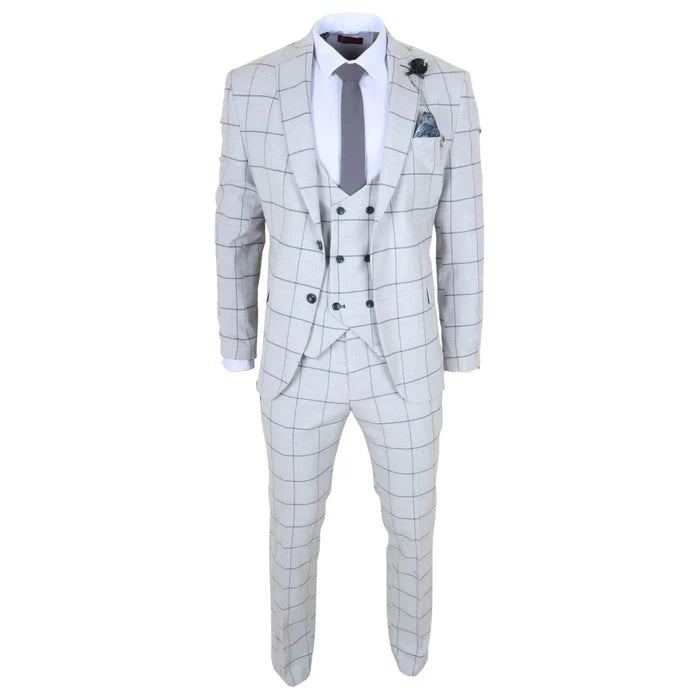 Close-up of men's light grey plaid check suit with notch lapel, buttoned blazer, and decorative lapel pin, perfect for formal occasions.