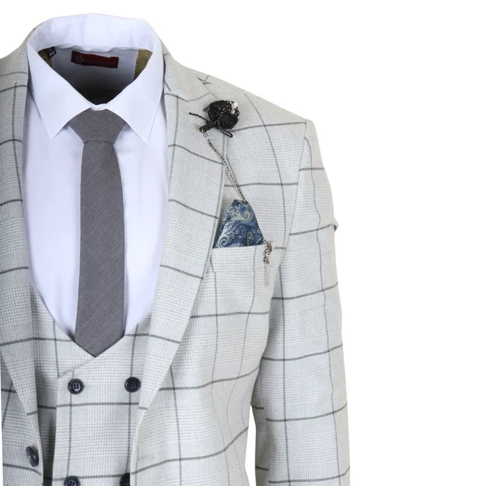 Men's light grey plaid check suit with tailored fit, featuring a notch lapel, double-breasted waistcoat, and a blue paisley pocket square, ideal for formal occasions.